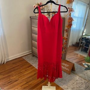Red mermaid style dress with sweetheart neckline. Size medium. Holiday wear.